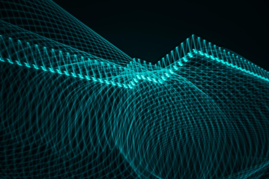 An abstract teal data visualization of layered wave lines.